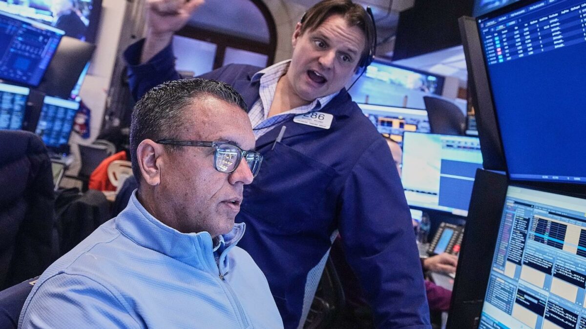 Wall Street flirts with record high as GM, UnitedHealth report earnings