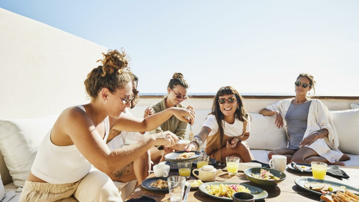 A group of smiling female friends.