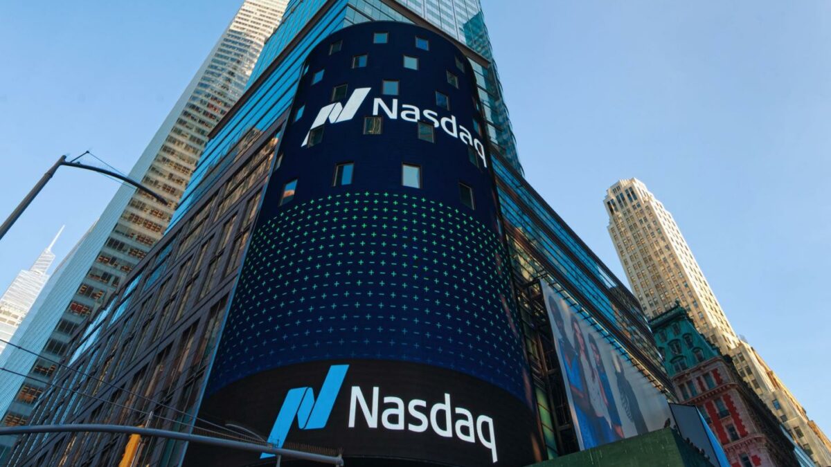 Giant LED display of the Nasdaq logo in a building.