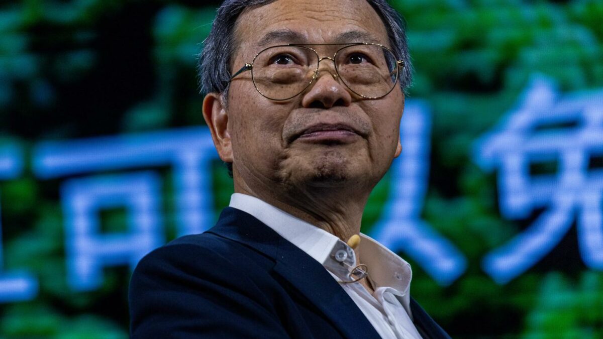 Man in a suit with glasses