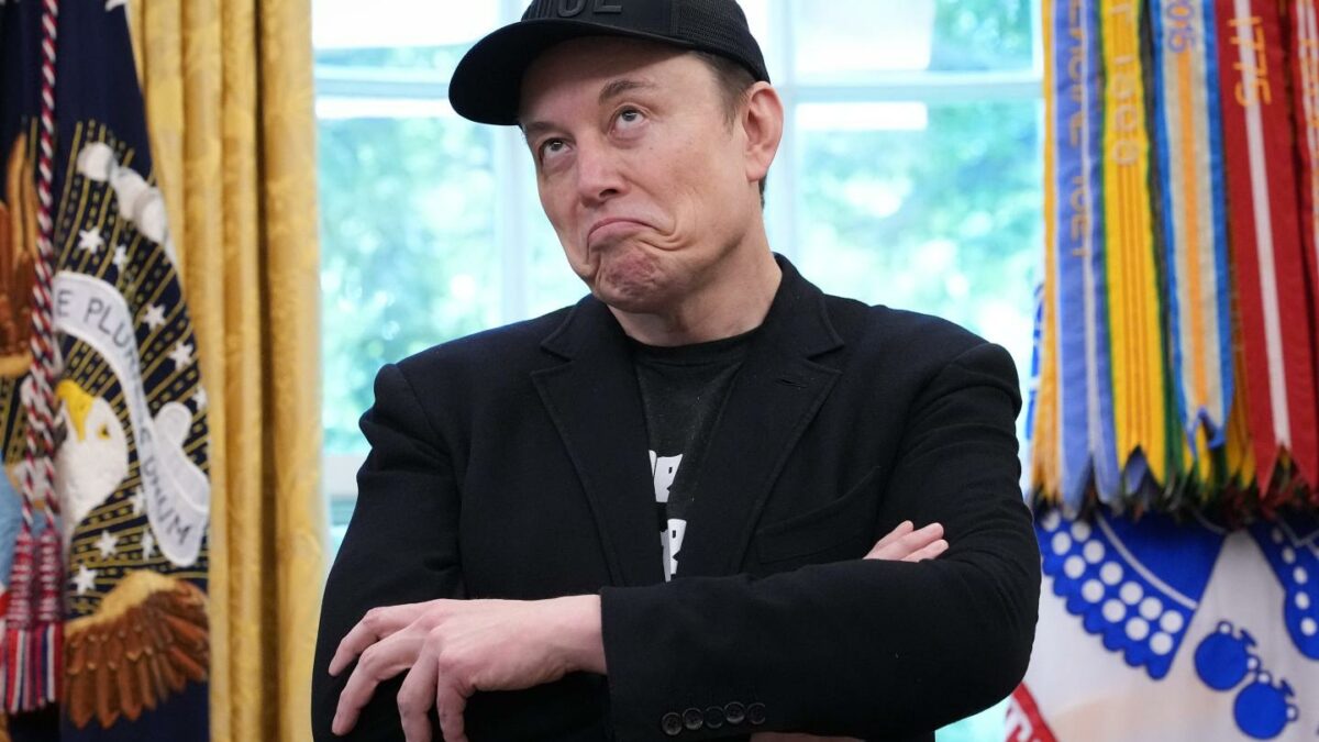 Man in a black hat and jacket