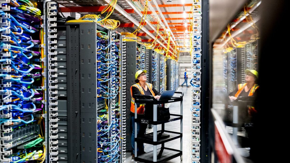 A technician at an Amazon Web Services AI data center in New Carlisle, Ind., Oct. 2, 2025.