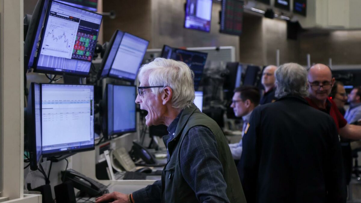 Traders work after a Federal Open Market Committee (FOMC) meeting on the floor of the New York Stock Exchange (NYSE) in New York, US, on Wednesday, March 18, 2026.