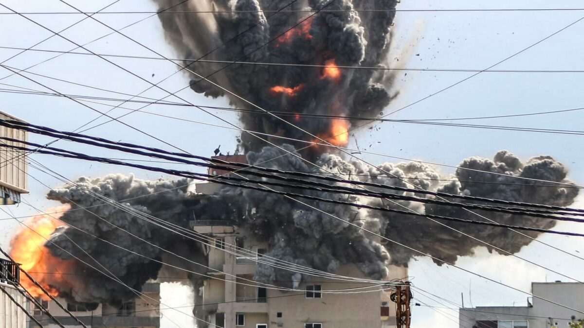 Photo: A fireball rises from a building hit by an Israeli airstrike in the area of Abbasiyeh, on the outskirts of the southern Lebanese city of Tyre, on April 8, 2026. Lebanon's army warned people against returning to the country's south on April 8, where the Israeli military is still launching attacks, as Israel said the ceasefire with Iran did not include its conflict with Hezbollah. (Photo by Kawnat HAJU / AFP via Getty Images)