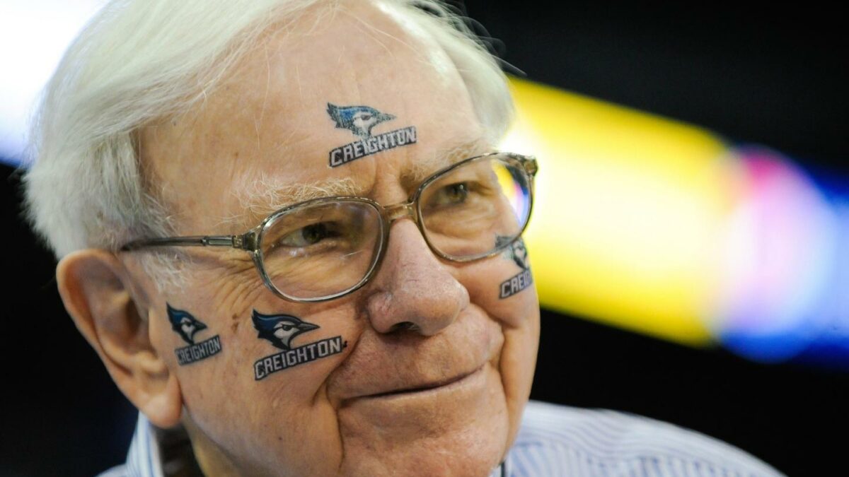 Warren Buffett with Creighton basketball temporary tattoos on his face