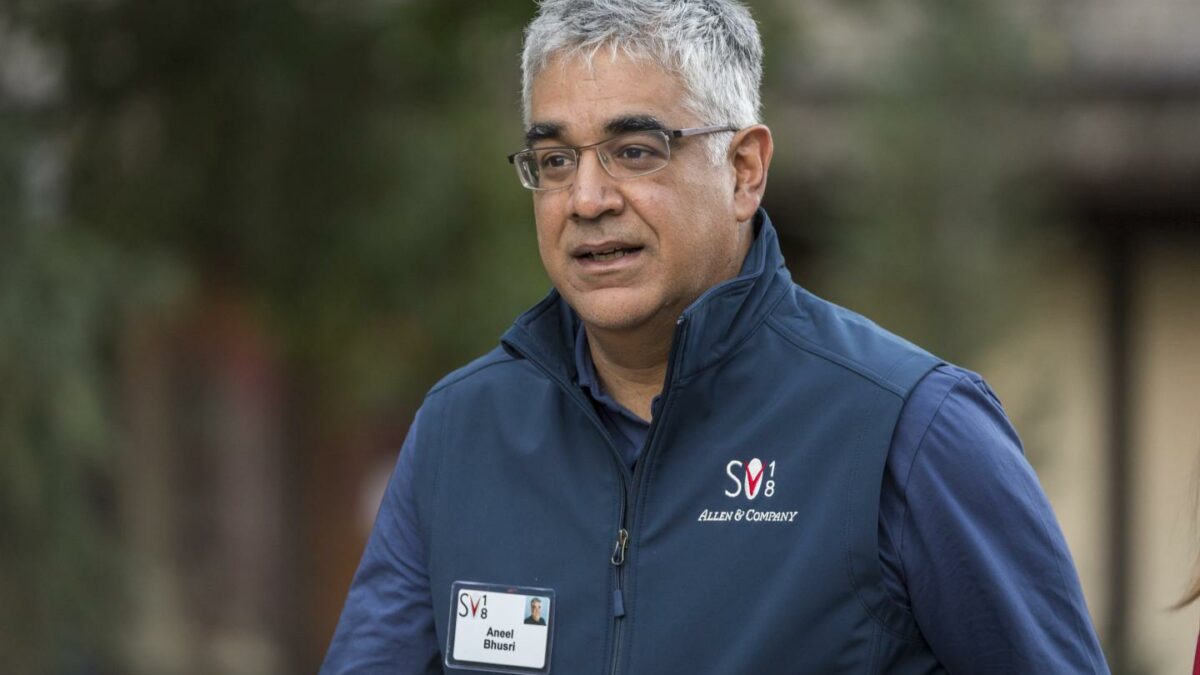 Man wearing glasses and a sweatshirt.
